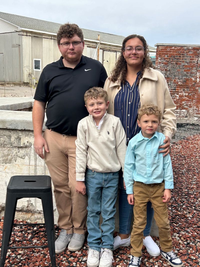 Image of the Bonar family. Back row left to right: Austin, Cierra. Front row left to right: Liam, Deacon